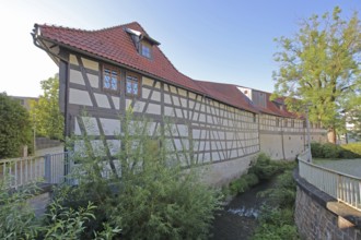 Armoury museum built in 1668, half-timbered house, rear, Lauter, stream, Suhl, Franconia,