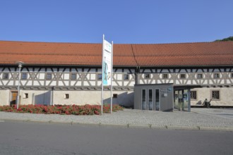 Entrance to the arms museum built in 1668, half-timbered house, museum, entrance, banner, Suhl,