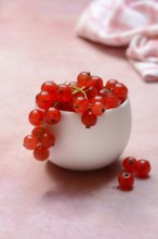 Redcurrants in small bowls, Ribes rubrum