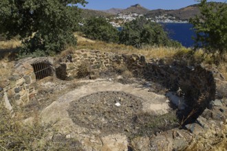 Lost place, base of an anti-aircraft battery, overlooking a village and the sea, surrounded by dry