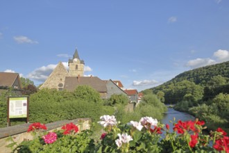 Werra bridge with geraniums and St Bartholomew's Church, bank, houses, idyll, flower decoration,