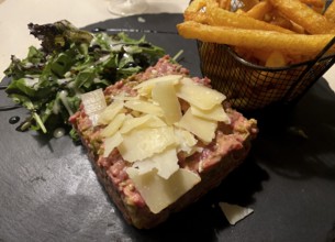 Portion of tartare, parmesan cheese, beef, French fries, salad, Étretat, Normandy, Seine-Maritime,