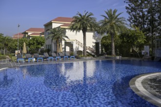 Swimming pool of the Resort De Coração, near Ramnagar, Corbett National Park, Uttarakhand State,
