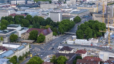 View of Stuttgart city centre. Crossroads at Gebhard-Müller-Platz. Top right the main railway