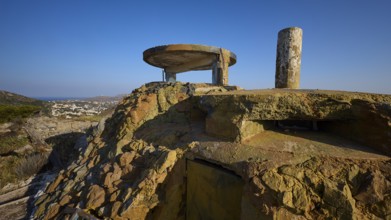 An old, dilapidated concrete building on a hill with a sea backdrop, Lost Place, Lago anti-aircraft