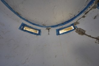 Interior of an abandoned dome with blue window frames and peeling plaster, Lost Place, Lago