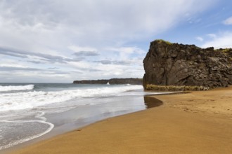 Skarðsvík Beach, golden sandy beach and cliffs, coastal landscape with bay, Skardsvik,