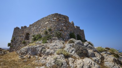 Old stone castle ruins on a rocky hill under a clear blue sky, Pandeli Castle, castle, Leros