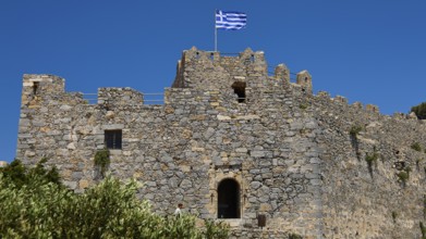 Stone castle with Greek flag and window, Pandeli Castle, Castle, Leros Fortress, St John's