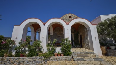 Panagia Kyra Church, Panagia tou Kastrou, Small church with striking arches and flowerbeds against