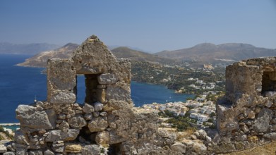 View of ancient ruins with background of blue sea and mountains in Mediterranean, Pandeli Castle,