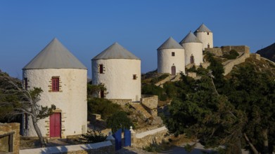 Five white windmills on a hill in front of a blue sky, Pandeli Castle, Castle, Leros Fortress, St