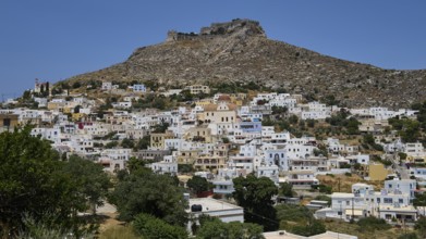 White village on the slope of a rocky mountain under a blue sky, Pandeli Castle, castle, Leros
