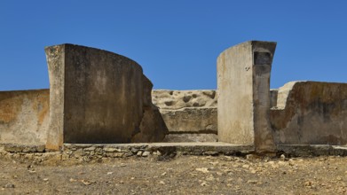 Weathered concrete wall structures in dry environment under blue sky, Lost Place, Air Defence