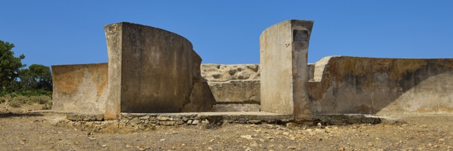 Dilapidated concrete wall structures in a dry, sunny environment, Lost Place, Air Defence Position,