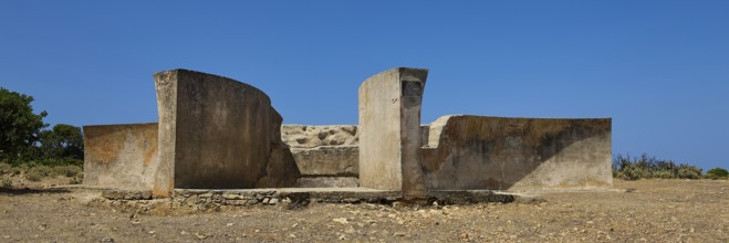 Old concrete ruins under a clear blue sky in an arid landscape, Lost Place, Air Defence Position,