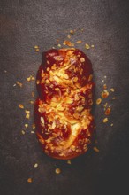 Braided, sweet bread pie, with sliced almonds, breakfast, braided bread, brioche, on a dark