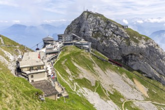 Mount Pilatus Mountain summit with cable car and cog railway in the Swiss Alps in Pilatus,