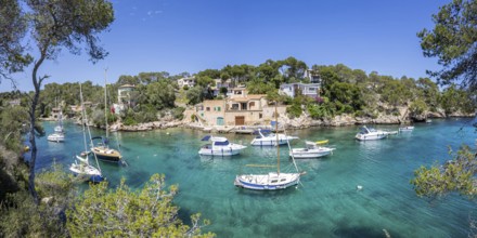 Bay of Cala Figuera on Majorca with boats panoramic holiday by the sea trip in Cala Figuera, Spain