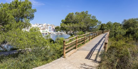 Portocolom fishing village on Majorca with boats and colourful houses Holiday by the sea Panorama