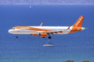 An EasyJet Airbus A321neo aircraft with the registration G-UZMG at Rhodes Airport, Greece