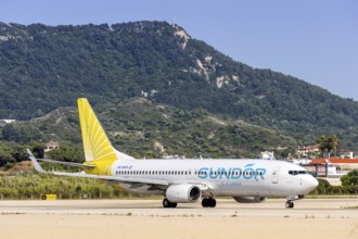 A Boeing 737-800 Sun d'Or aircraft with the registration number 4X-EKR at Rhodes Airport, Greece