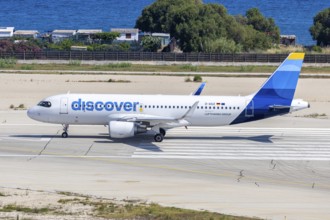 An Airbus A320 aircraft of Discover Airlines with the registration D-AIUZ at Rhodes Airport, Greece