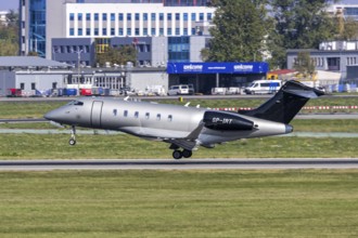 A Bombardier Challenger 3500 Jet Story aircraft with the registration number SP-IRT at the airport