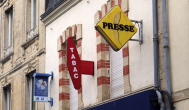 Typical sign of a shop for tobacco, press, magazines, gambling, old town, Bayeux, Normandy,