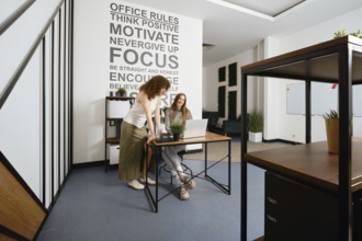 Two young women rejoice at the successful launch of their health program project