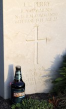 Bottle of Spitfire Kentish Ale, beer, at a gravestone, war graves, military graves, British and