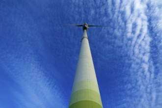 Wind turbine with small fleecy clouds (cirrocumulus) in the sky, Karsberg, Upper Franconia,