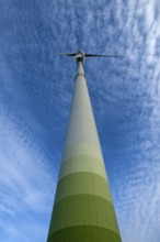 Wind turbine with small fleecy clouds (cirrocumulus) in the sky, Karsberg, Upper Franconia,