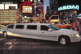 Stretch limousine at Time Square in the evening, New York, USA