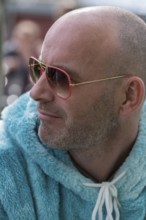Portrait of a young man with sunglasses and fluffy jacket, Baden-Württemberg, Germany