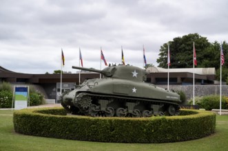 Sherman tank of the US Army is on display in front of the museum, Musée memorial 1944 de la