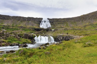 Dynjandi, Dynjandifoss or Fjallfoss, tourists, hikers at the waterfall in summer, river Dynjandisá,