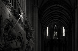 Interior view, angel on pulpit, holding a shining sword, Cathédrale Notre-Dame de Bayeux, black and