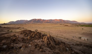 Desert landscape with Brandberg at sunrise, Erongo, Damaraland, Namibia