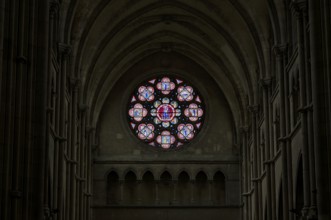 Rose window, coloured stained glass window, choir with altar, interior view, Église Notre-Dame