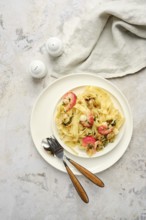 Delicious fettuccine allo Scoglio features an array of seafood mixed with pasta, presented