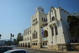Palace of Justice, Colonial building, A street with a historic building, clock tower and palm trees