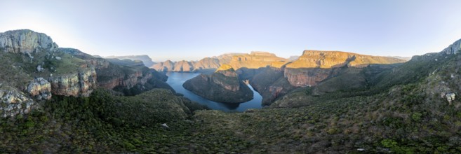 Panorama, sunset at Blyde River Canyon with Three Rondawels peak, view of canyon with Blyde River