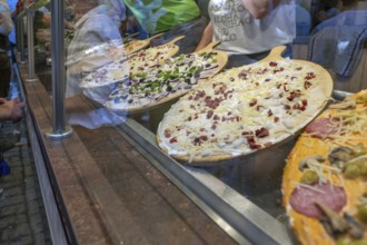 Various tarte flambée toppings at the Erlangen Bergkirchweih, traditional twelve-day folk festival,