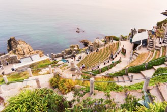 Minack Theatre, spectacular open-air theatre, circular path with lush planting, South England