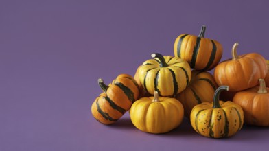 Close up of small orange pumpkins with stripes on purple banner with copy space. Generative ai, AI