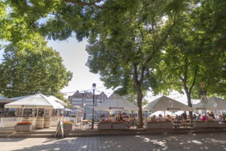 The Schlachte, historic riverside promenade along the Weser with restaurants and cafés in the shade
