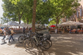 The Schlachte, historic riverside promenade along the Weser with restaurants and cafés in the shade