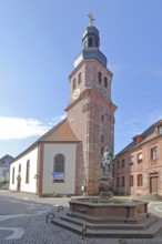 Baroque Luther Church built in 1758 and cobbler's fountain, sculpture, cobbler, symbol of former