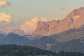 Dramatic mountain range with clouds in the evening light, Alpe di Siusi, Dolomites, South Tyrol,